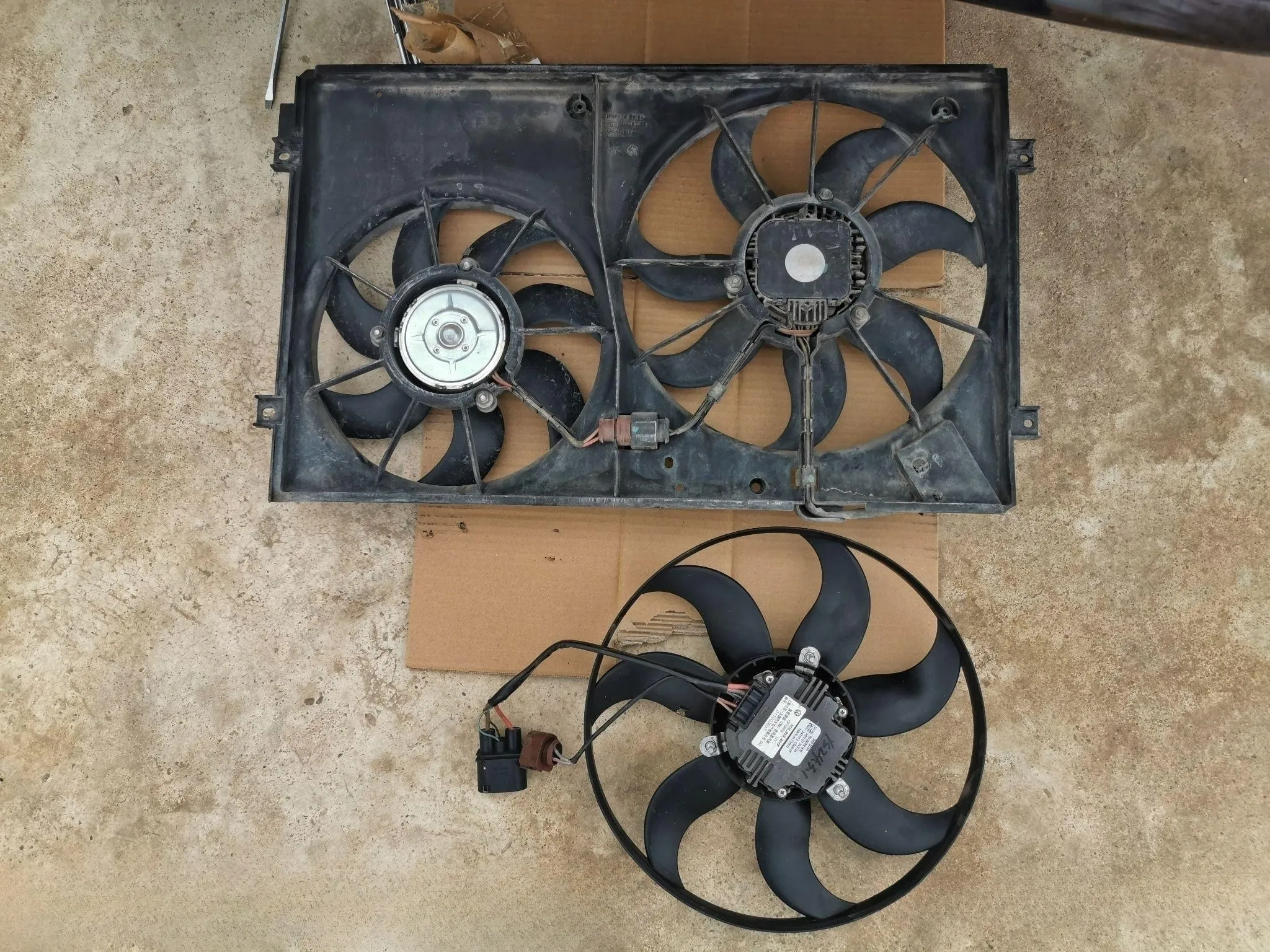 Old and new radiator fans side by side for comparison