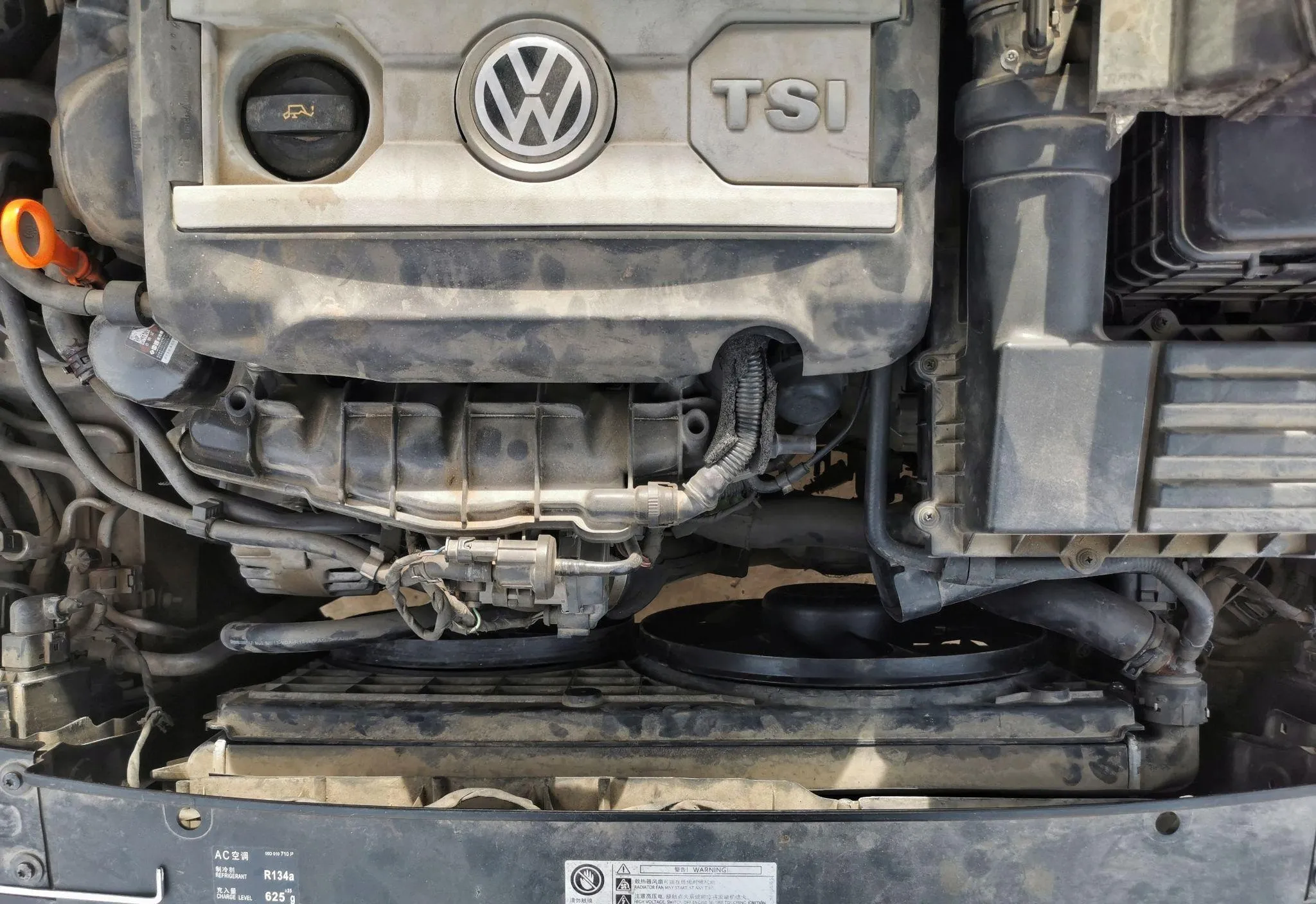Tightening upper fan bolts in engine bay